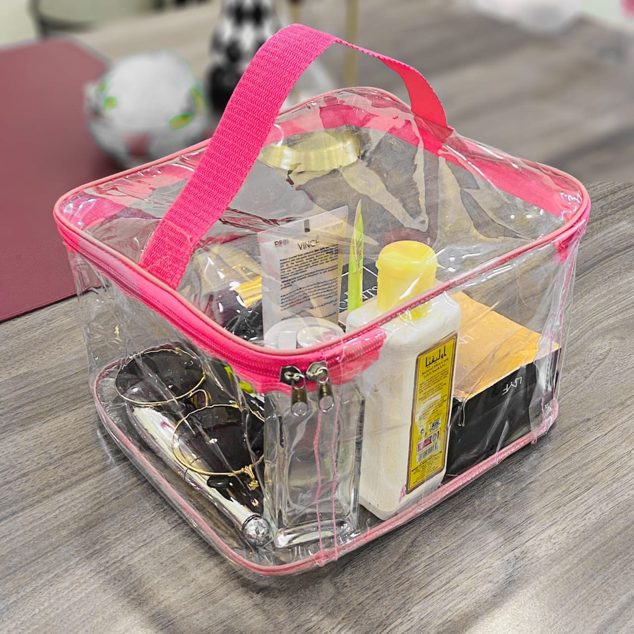 Transparent cosmetics pouch